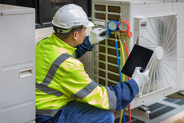 Professional Hvac technician working in Mayville, ND
